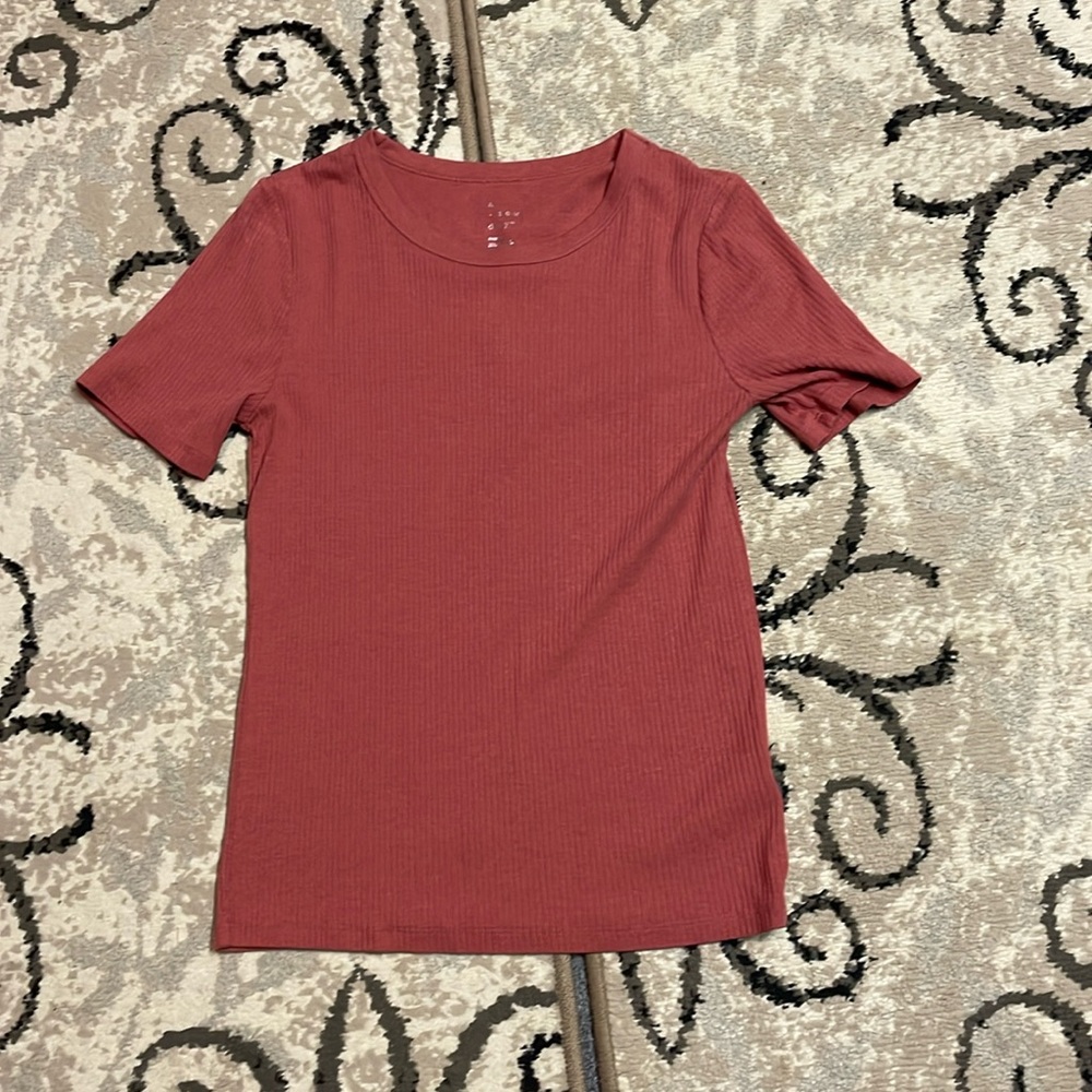 A new day, size medium, reddish tee shirt